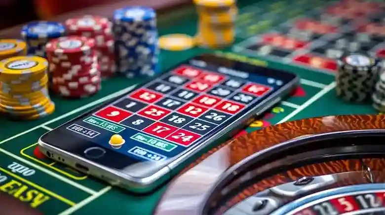 Màn hình điện thoại hiển thị giao diện Live Casino và Slot Online của bookmakers